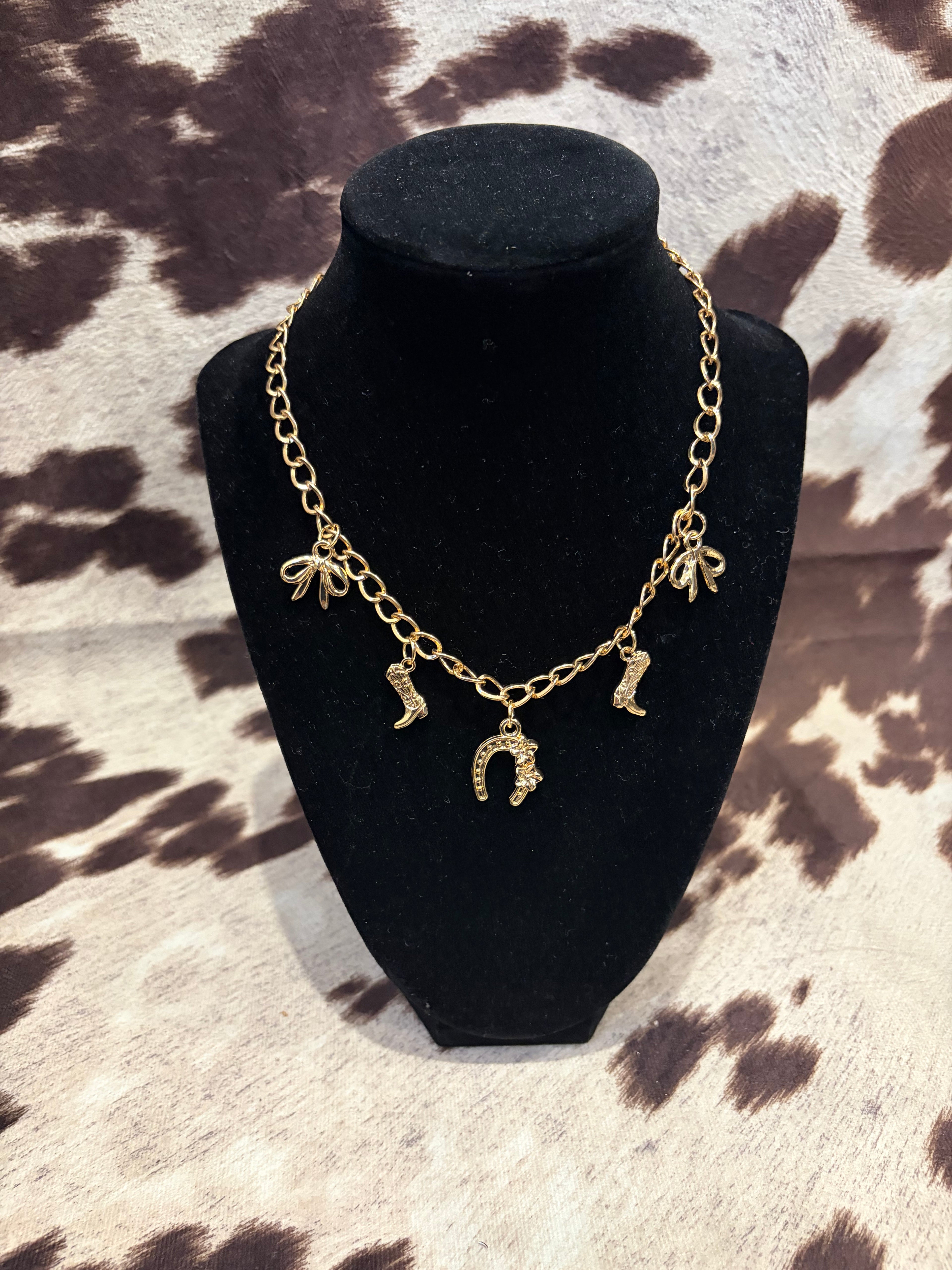 Gold cowgirl charm